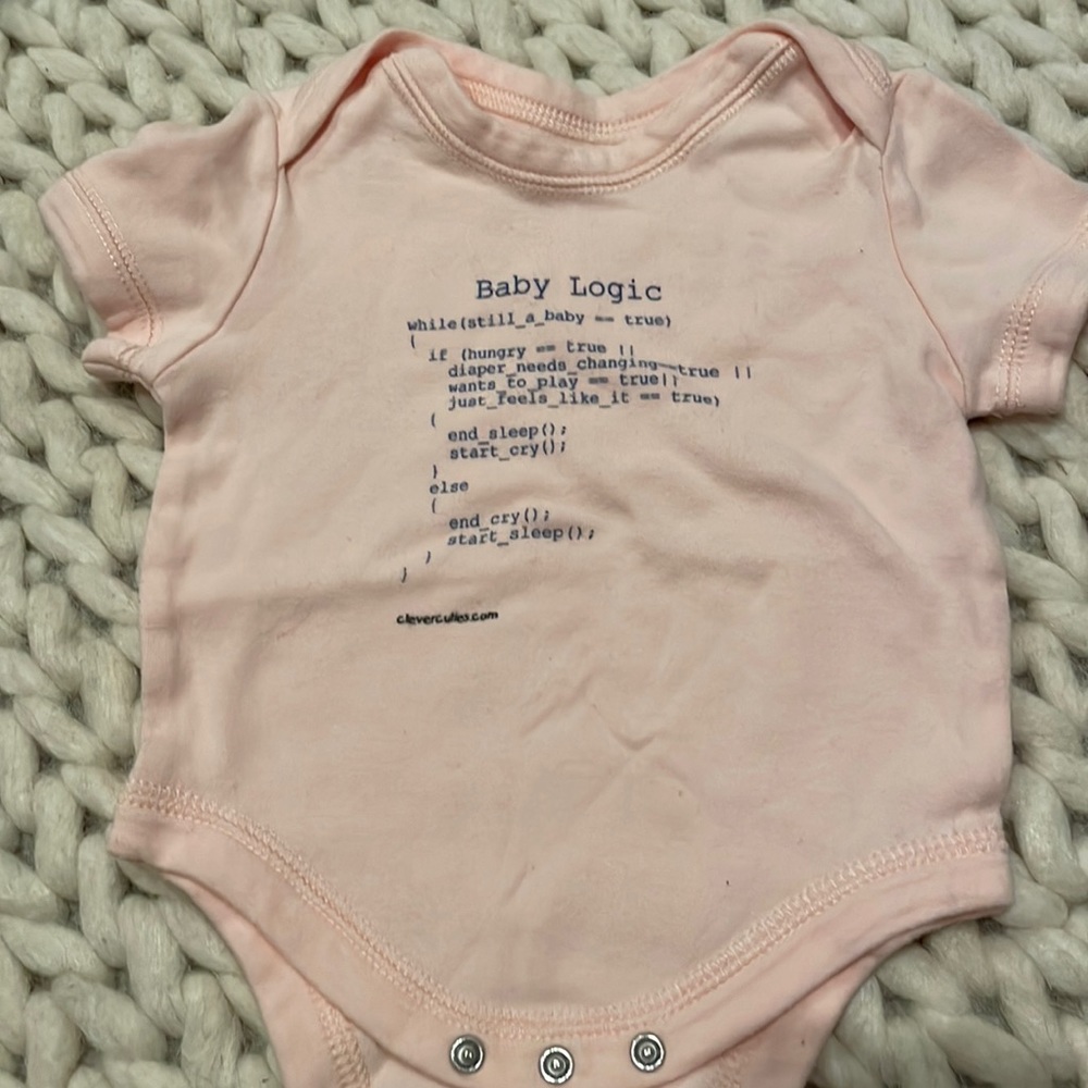 Onesie coloring is off in pic.  More of a pink